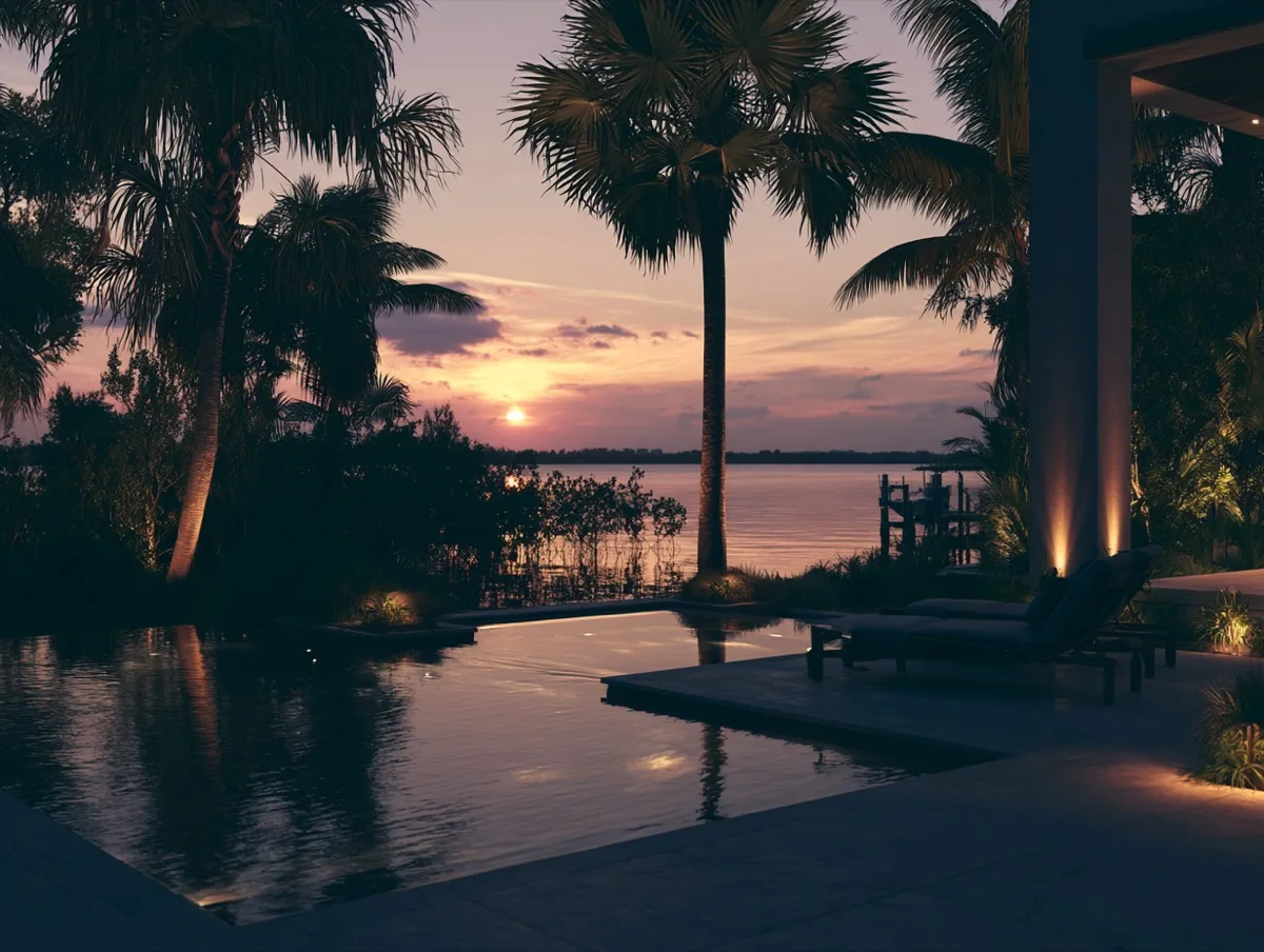 Naples bayfront pool at dusk, mangroves beyond